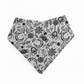 Black and white patterned bandana bib on a white background, featuring a spooky cute design with spiderwebs, bats, moons, leaves, treats.