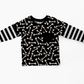 Black long-sleeve layered shirt: Main fabric is a white bone pattern, and black and white striped for the long sleeves. Handmade by My Spooky Baby. 