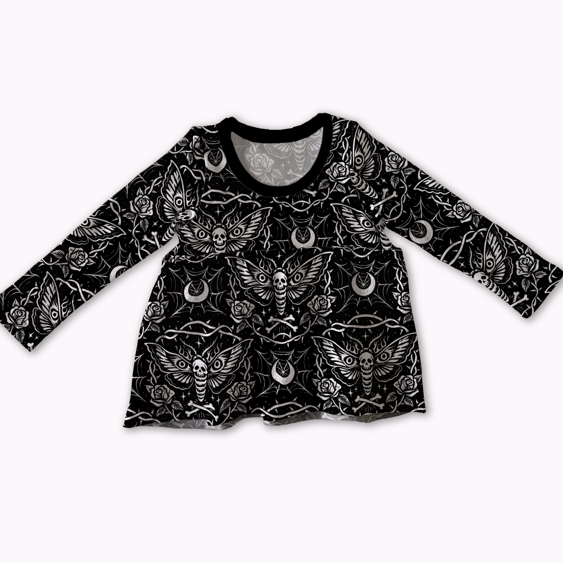 Handmade peplum top by My Spooky Baby, black long-sleeve shirt with white pattern featuring moth, moons, spiderwebs and bones. 