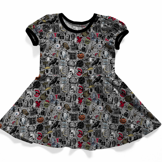 Baby Toddler or Youth dress, grey with ABC Halloween designs on it :  P for pumpkins, S for skulls, G for ghosts, S for spiders etc. Black neckband and sleeve bands. 