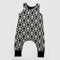 Black and White baby romper with checkers and skulls on it. Black cuffs. Handmade by My Spooky Baby.