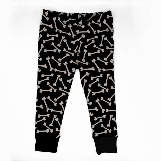 Black leggings with white bone pattern on a white background