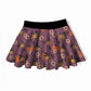 A girls flared skirt with a purple base featuring a Halloween pattern of pumpkins, witch hats, and flowers, finished with a solid black waistband.